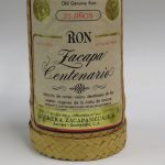 Lote: 2 - Lote: 2 - Porrón y botella de Ron