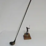 Lote: 16 - Lote: 16 - Palo de golf y trofeo