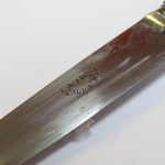 Lote: 125 - Lote: 125 - Cuchillo verijero