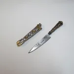 Lote: 125 - Lote: 125 - Cuchillo verijero