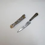 Lote: 125 - Lote: 125 - Cuchillo verijero